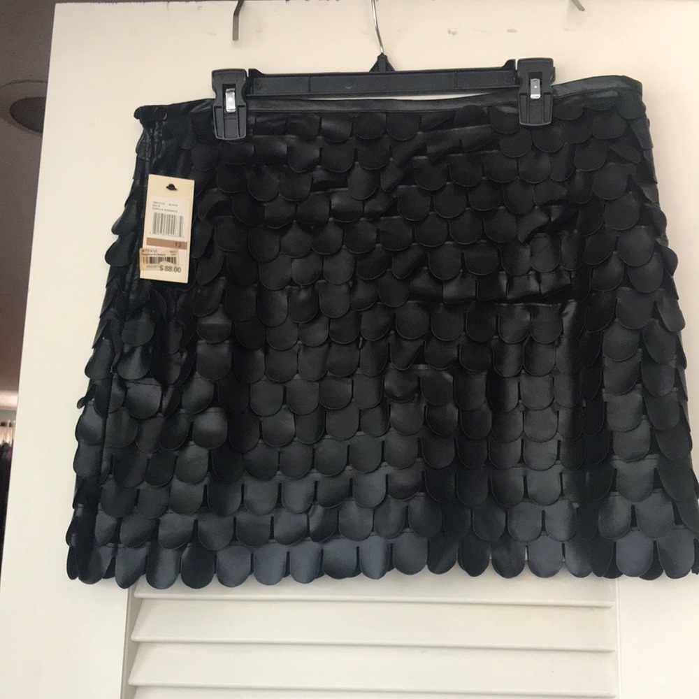 Black, mermaid pattern mini skirt.